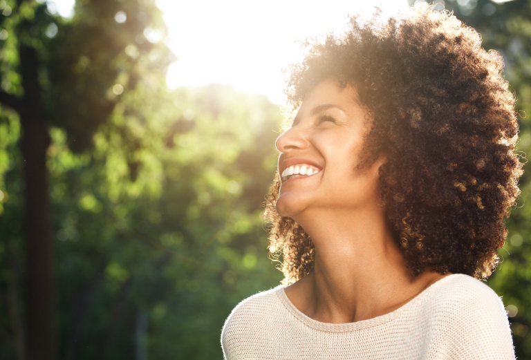 Confident woman smiling happily