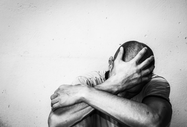 A Man is worried about life's challenges