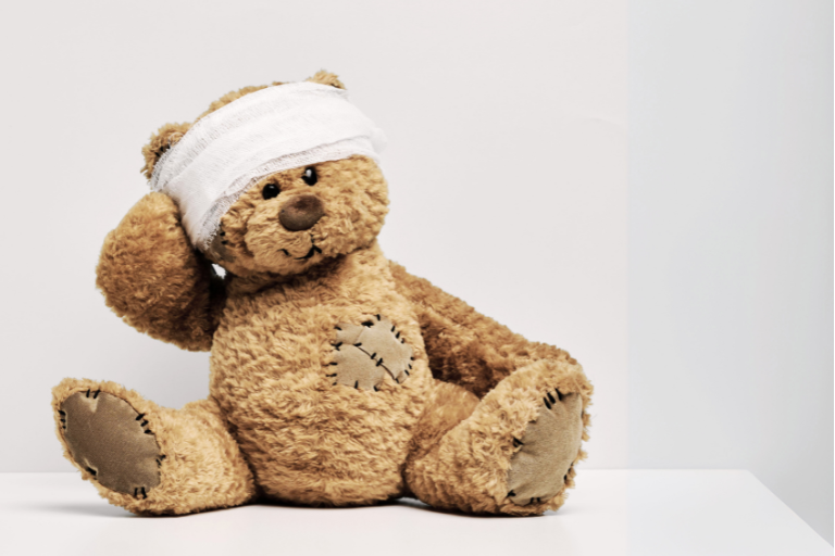 Little bear suffers childhood trauma with head wrapped