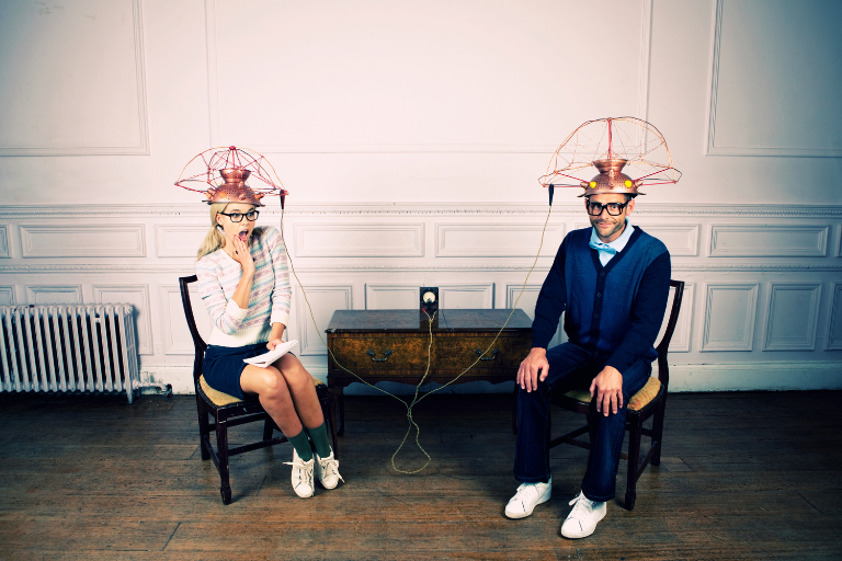 The Myth of Mind Reading in Love: A couple is trying to read each other's minds