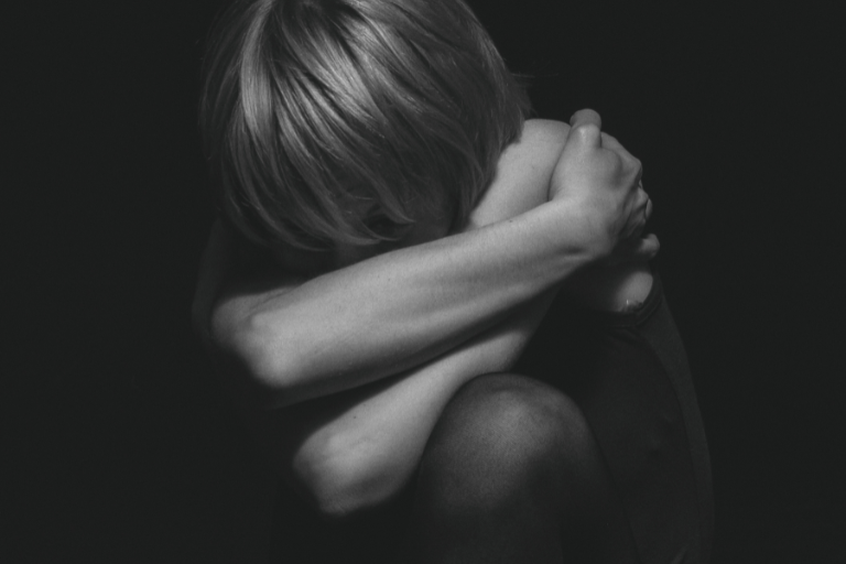 A woman whose self-worth is affected by past family trauma